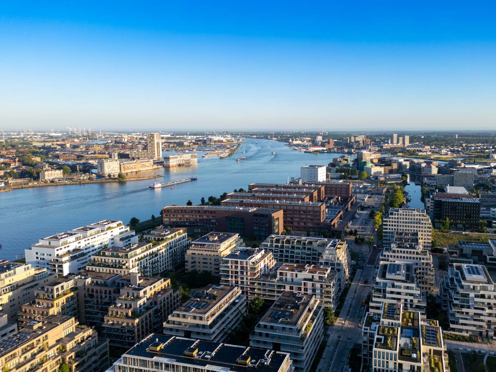 Aerial view of Amsterdam's waterfront and modern city districts – part-load removals to Amsterdam