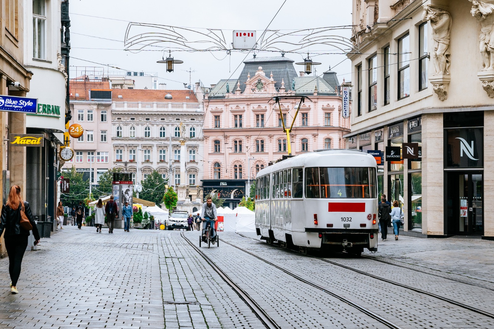 Tram passing historic buildings on a cobbled street in Brno – part-load removals to Brno