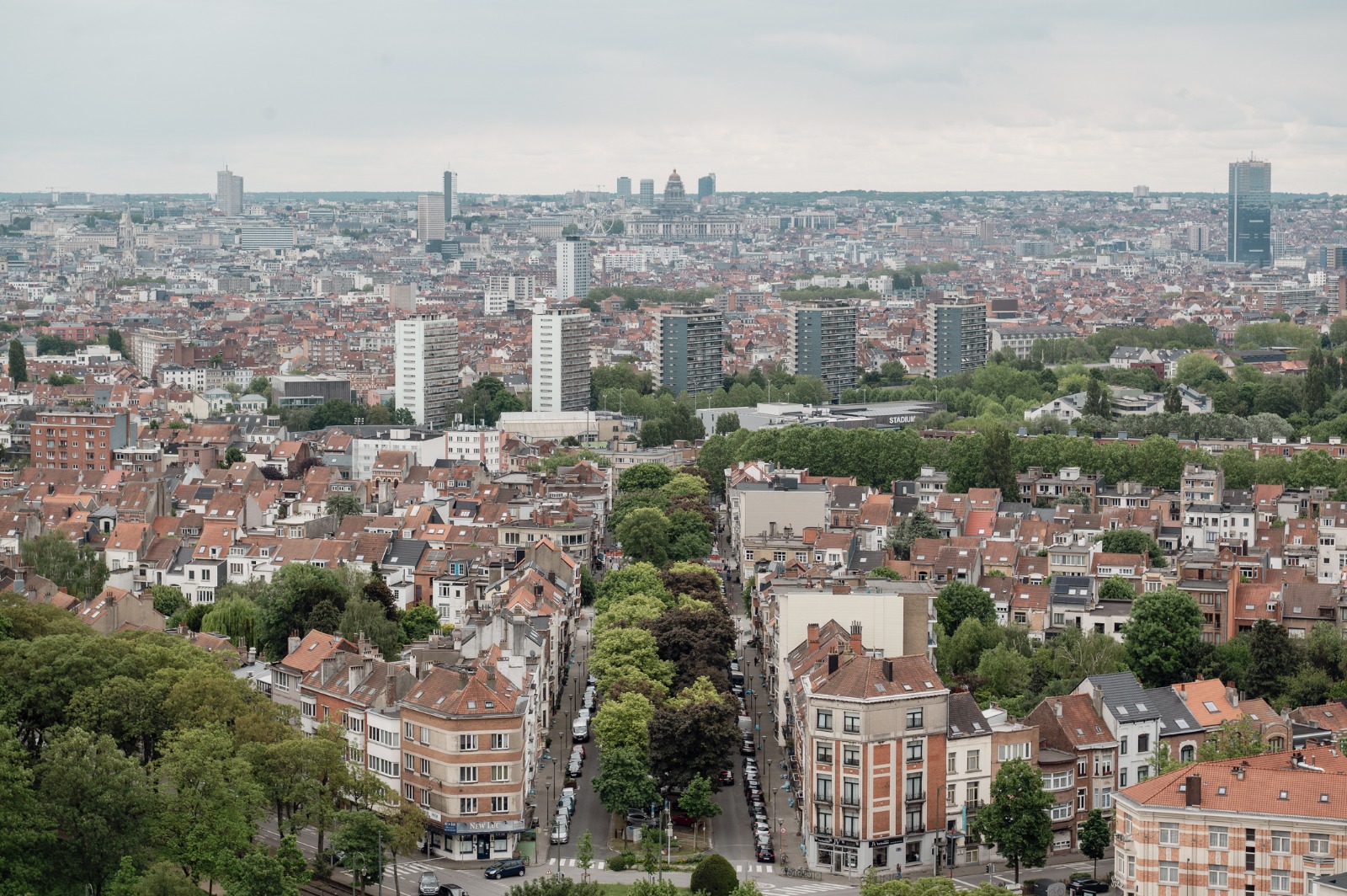 Aerial view of Brussels rooftops and tree-lined streets – removals from the UK to Brussels