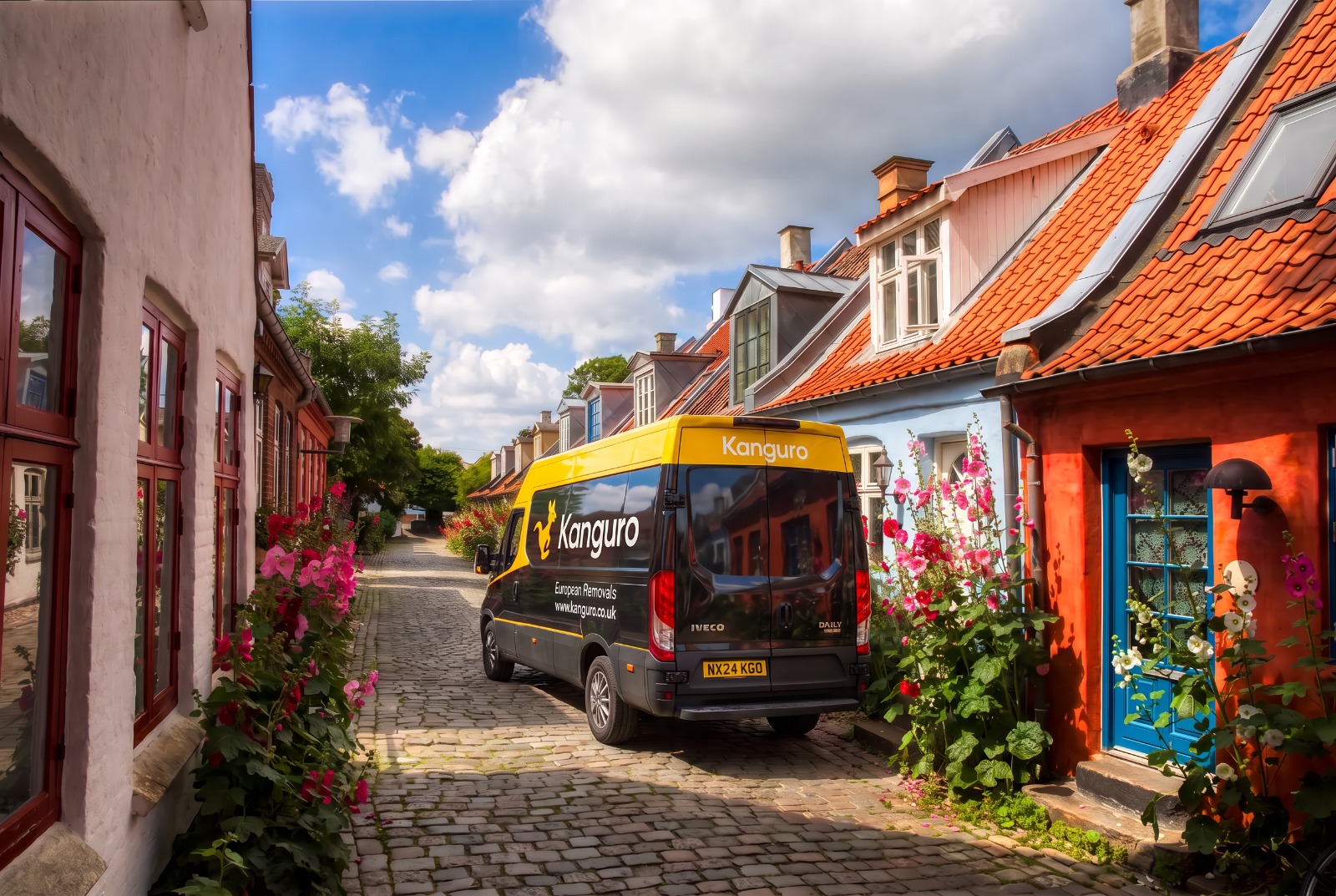 Kanguro removal van on a cobbled lane beside colourful houses in Denmark – man and van removals from the UK to Denmark