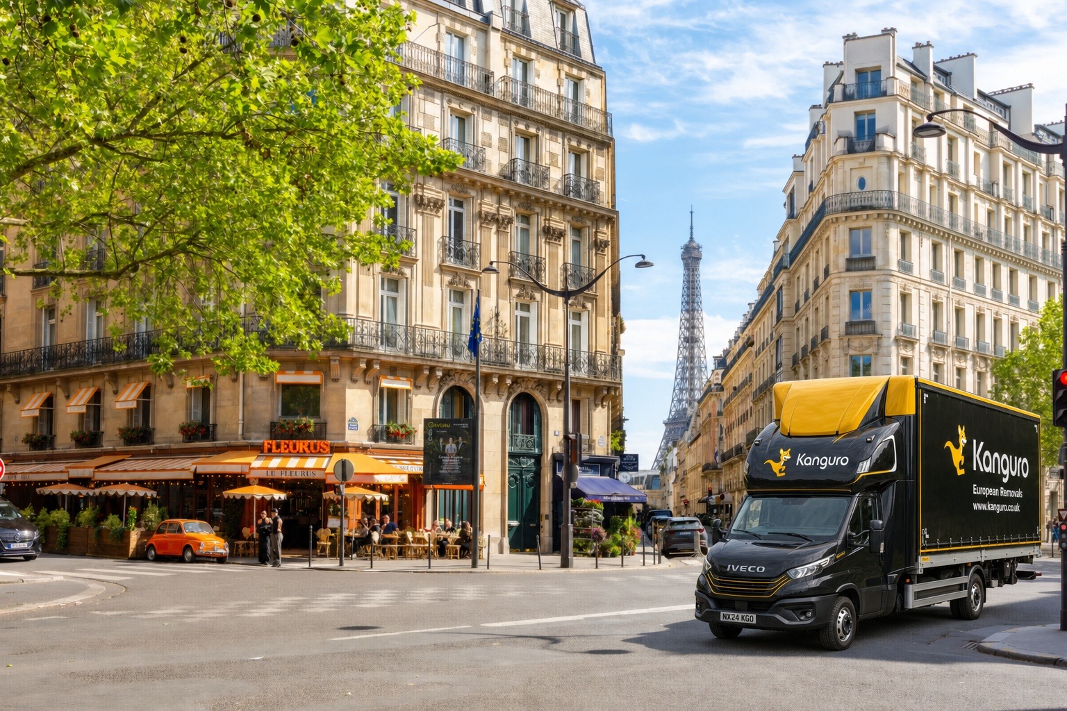 Kanguro removal van on a Paris street with the Eiffel Tower in the distance – removals from the UK to France