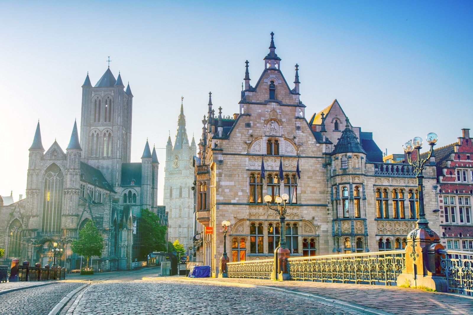 Historic waterfront buildings and church towers in Ghent – shared-load removals to Ghent