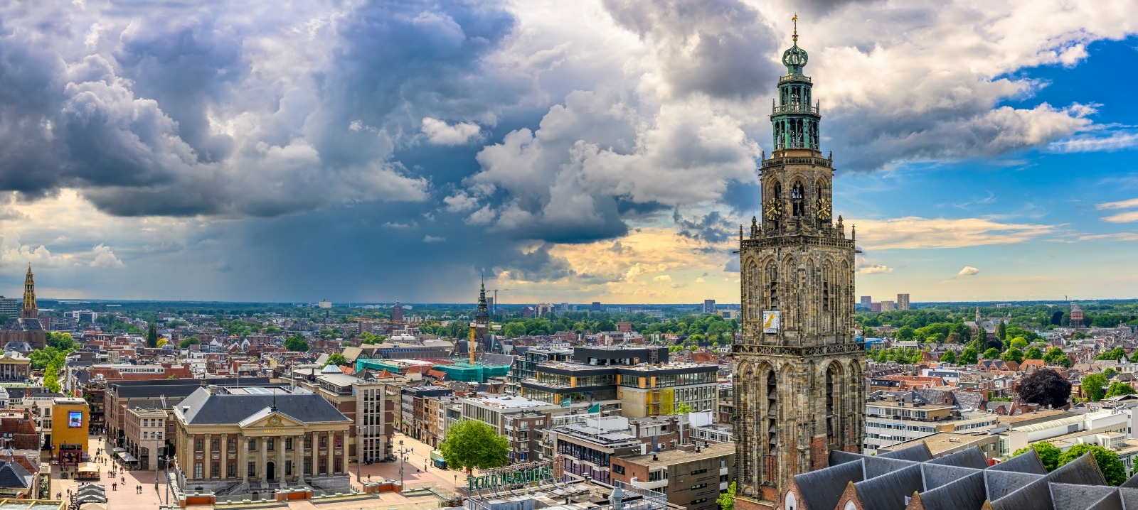 Groningen skyline with the Martinitoren above the rooftops – removals from the UK to Groningen