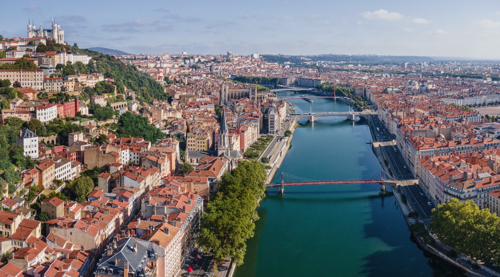 Lyon rooftops and bridges crossing the river – part-load removals to Lyon