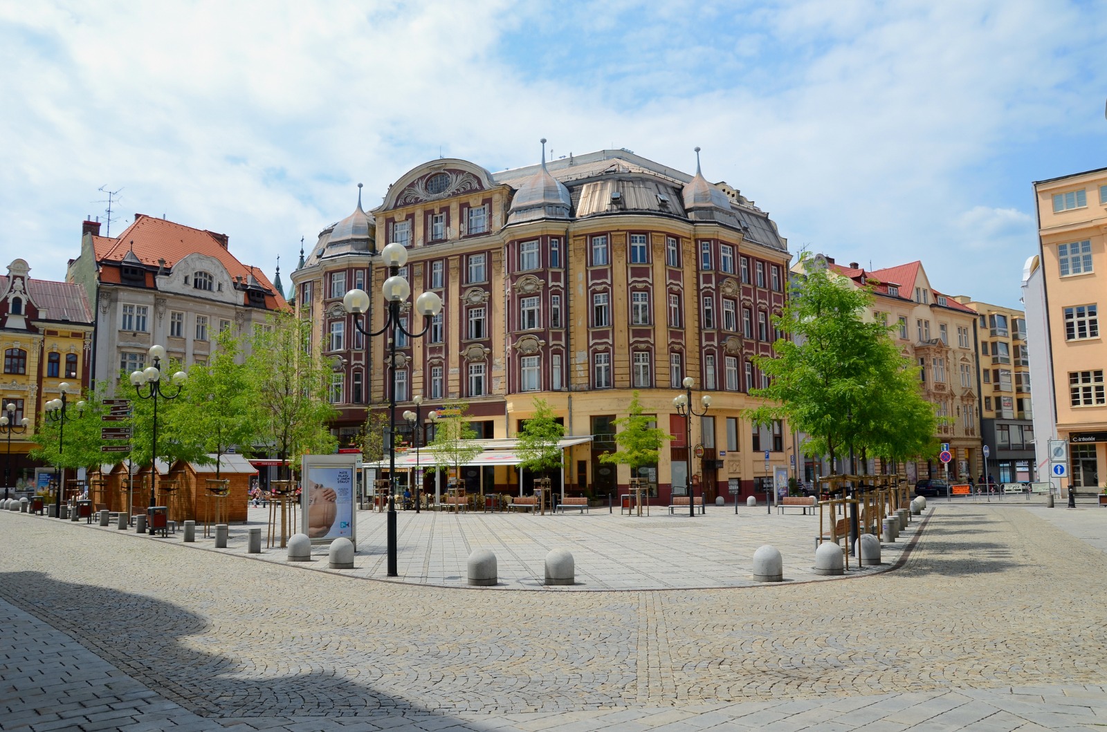 Ornate corner building and outdoor seating in Ostrava – removals from the UK to Ostrava