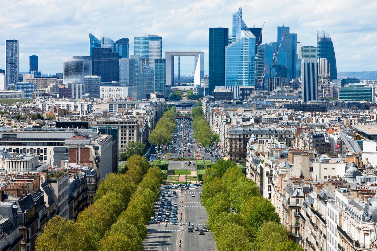 La Defense skyline and a tree-lined avenue in Paris – shared-load removals to Paris