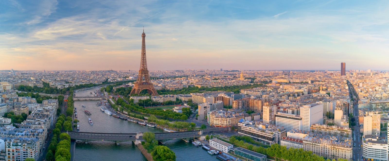 Eiffel Tower and the River Seine in Paris at sunset – moving from the UK to Paris