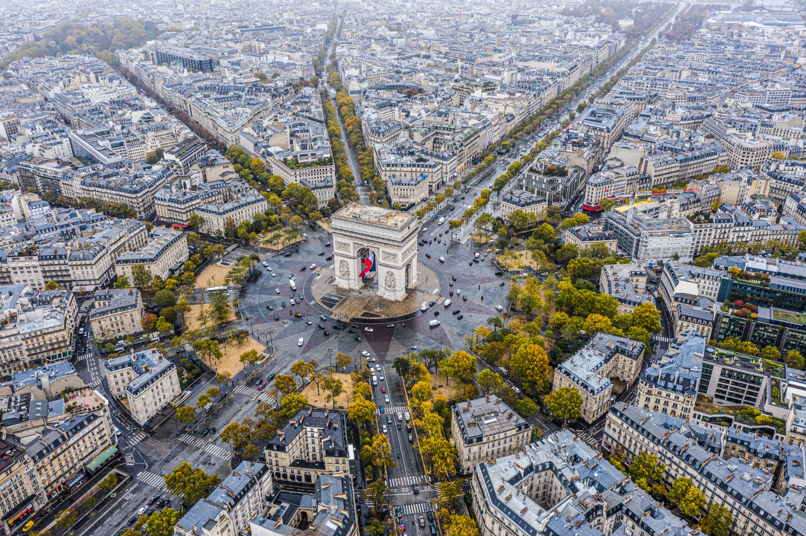 Aerial view of the Arc de Triomphe and surrounding avenues in Paris – removals from the UK to Paris