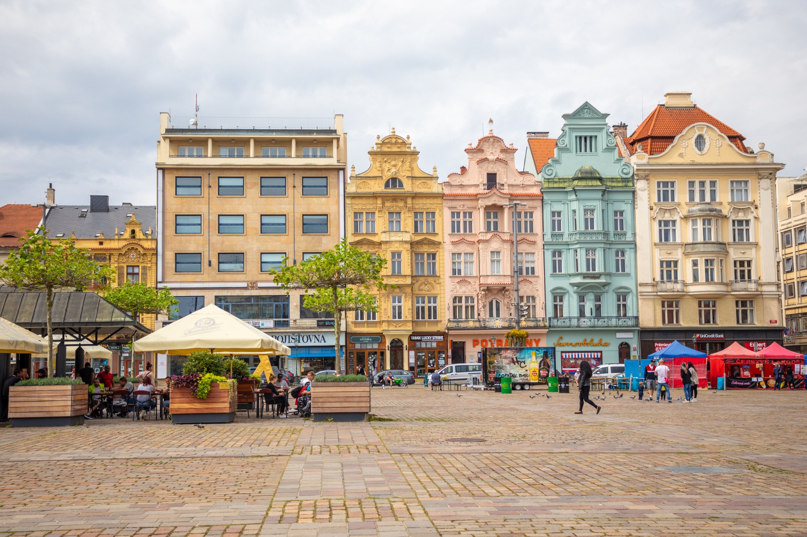 Colourful historic buildings around a market square in Pilsen – shared-load removals to Pilsen