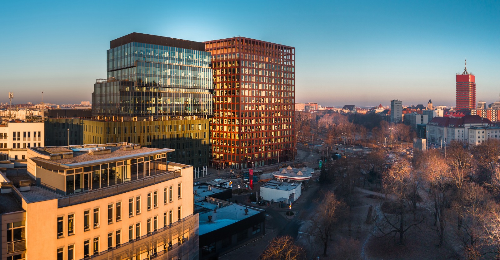 Modern office buildings in Poznan at sunset – removals from the UK to Poznań