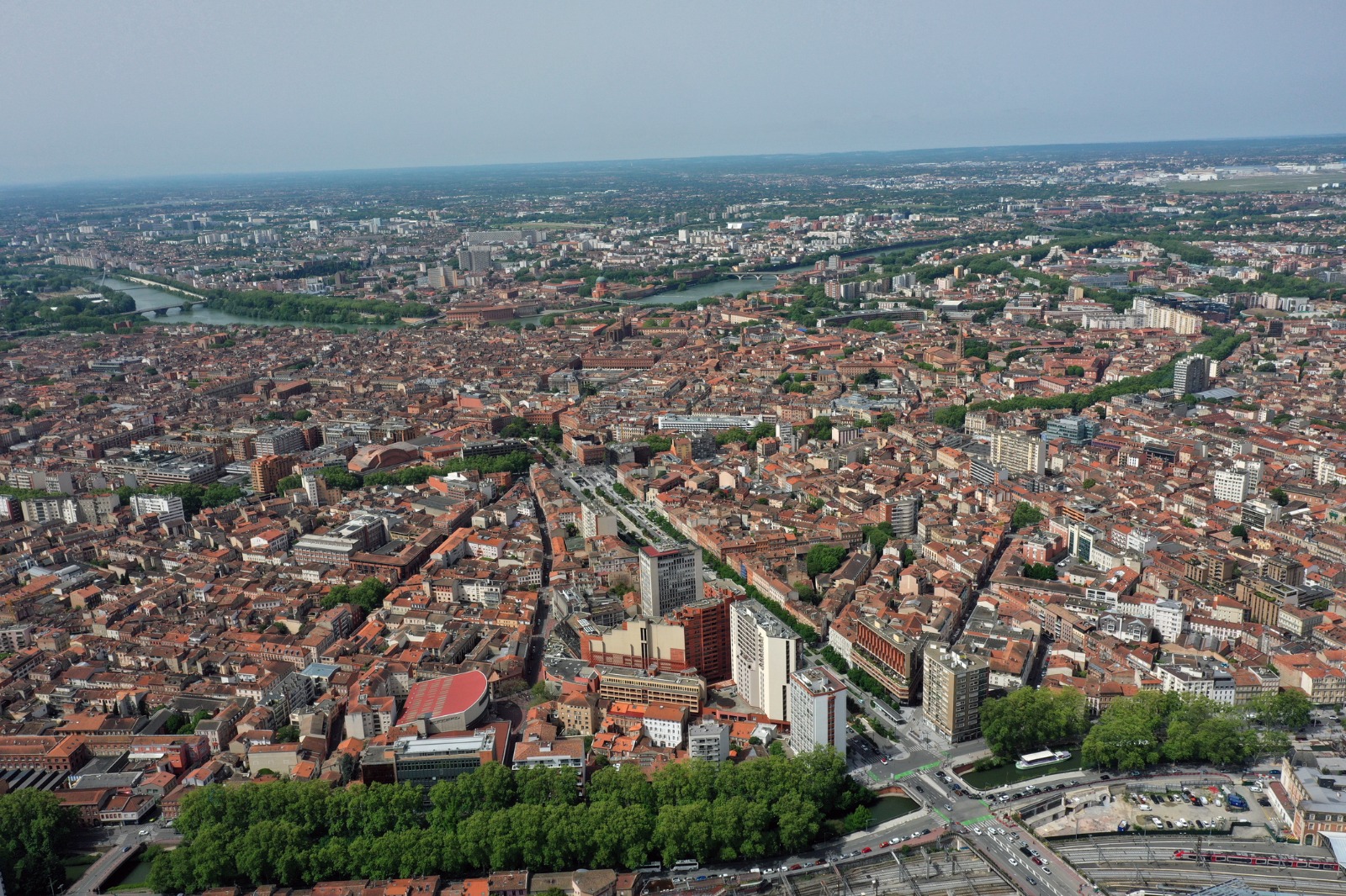Aerial view of Toulouse's rooftops and city streets – removals from the UK to Toulouse