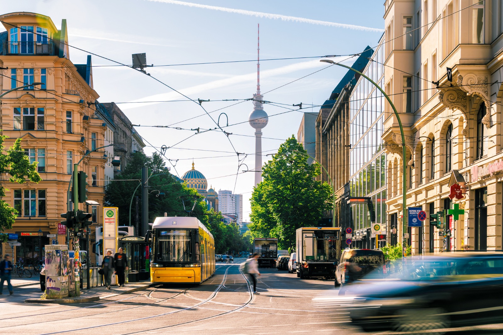 Tram on a Berlin street with the television tower in the distance – shared-load removals to Berlin