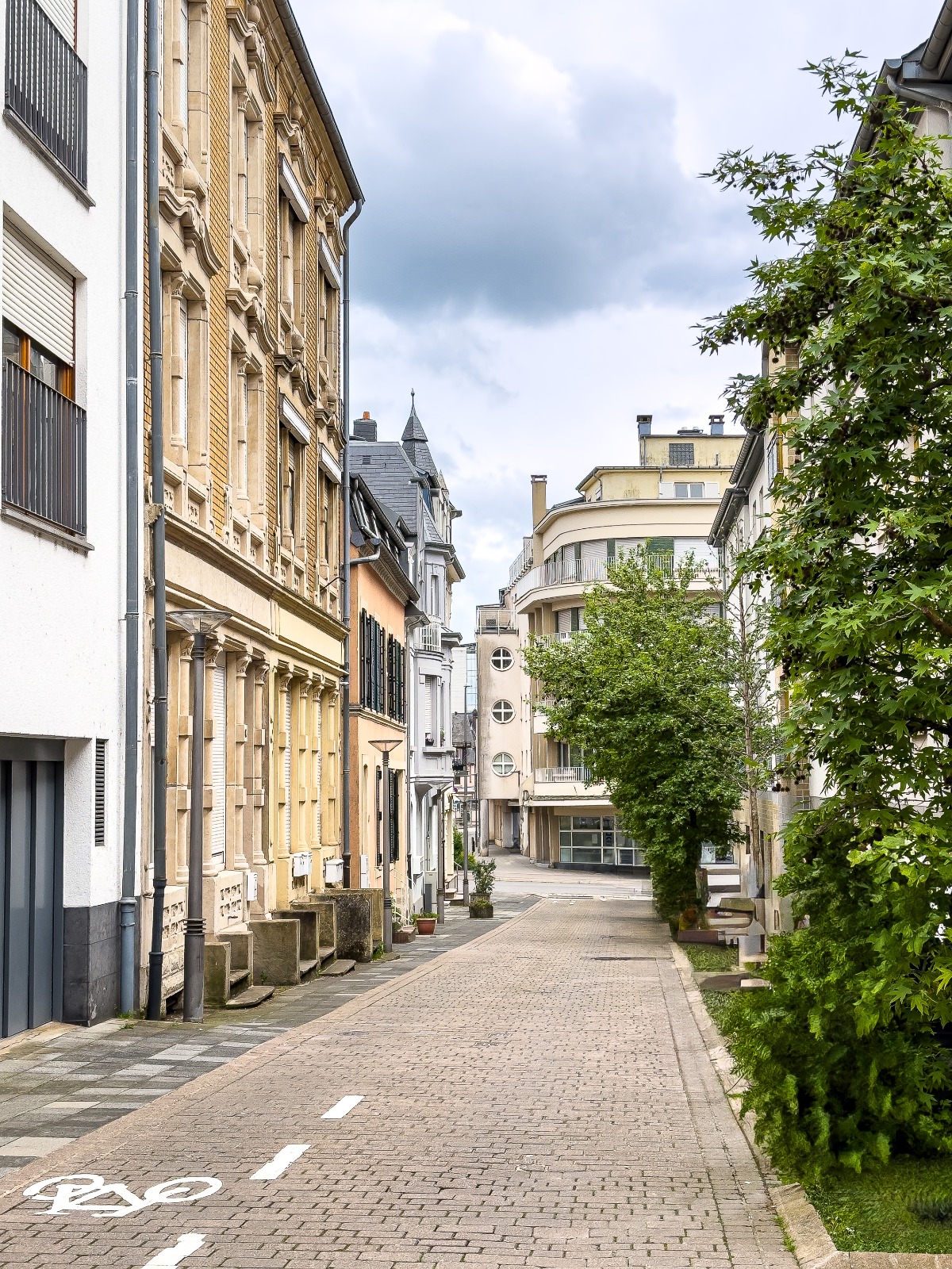 Quiet residential lane between townhouses in Luxembourg – removals from the UK to Luxembourg